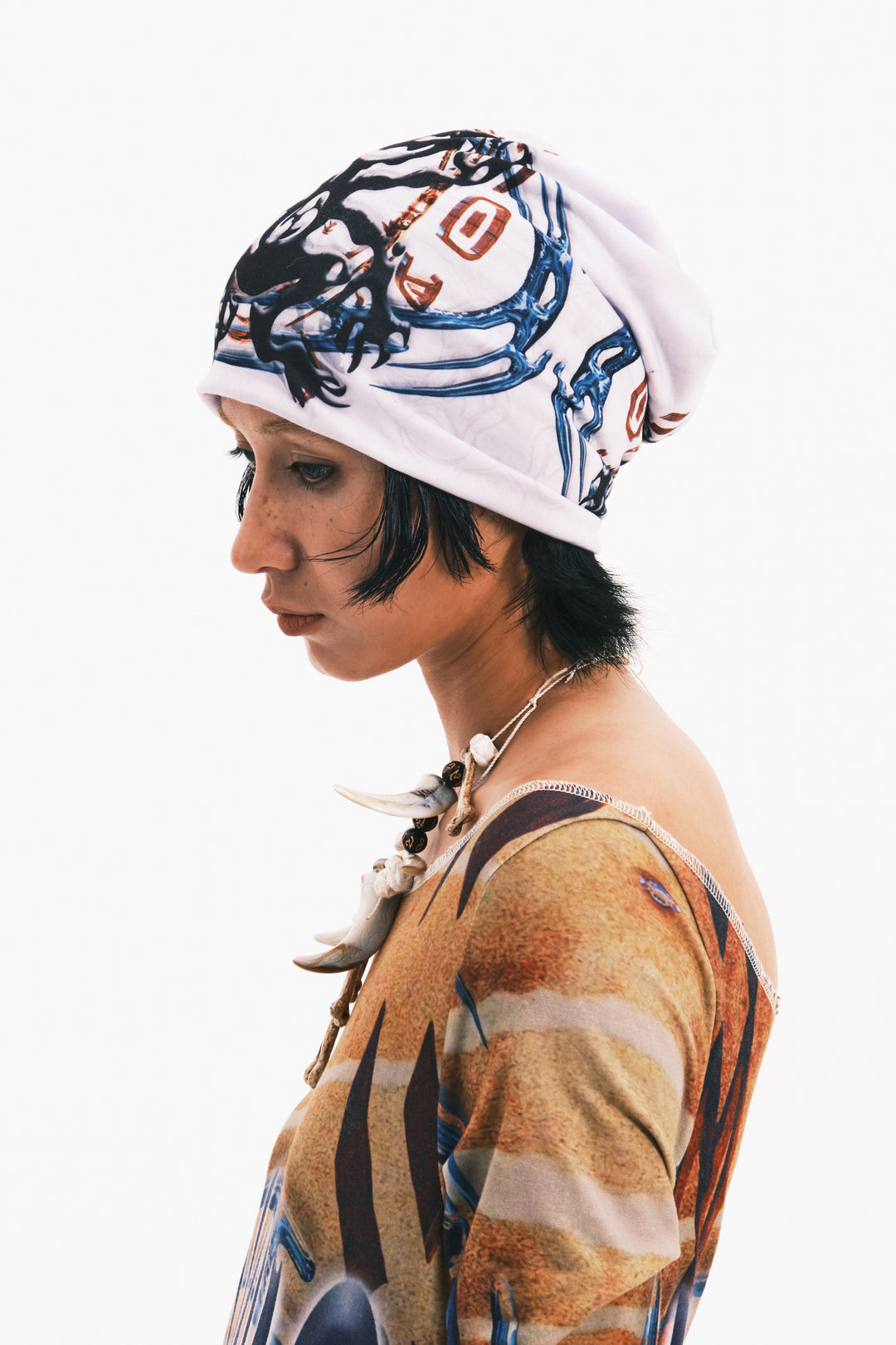 EMBRYO TRIBAL ENTITY graphic slouch beanie — alternate modeled angle