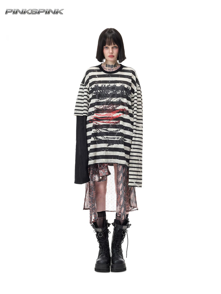 PINKSPINK VENOM rhinestone mesh shirt and mini skirt set in black and red — full front styling view with the shirt tied at the waist beneath a striped tee