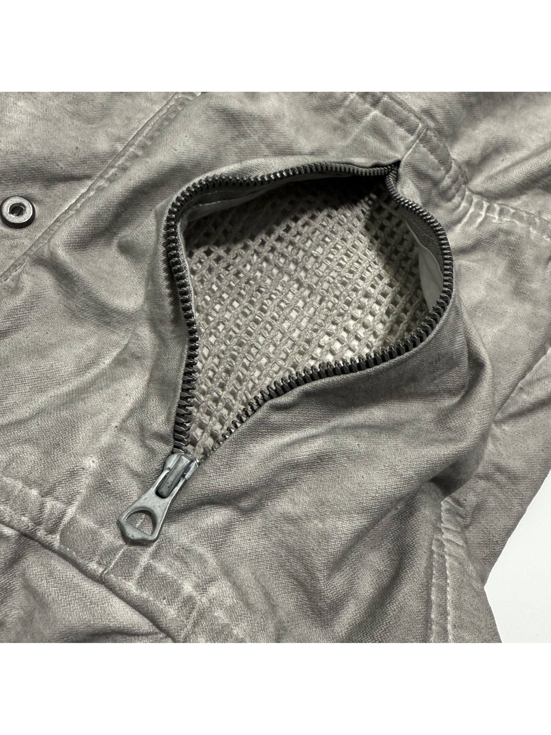 PIONEER meteor gray knee-mesh utility work pants — opened knee zipper revealing the mesh panel