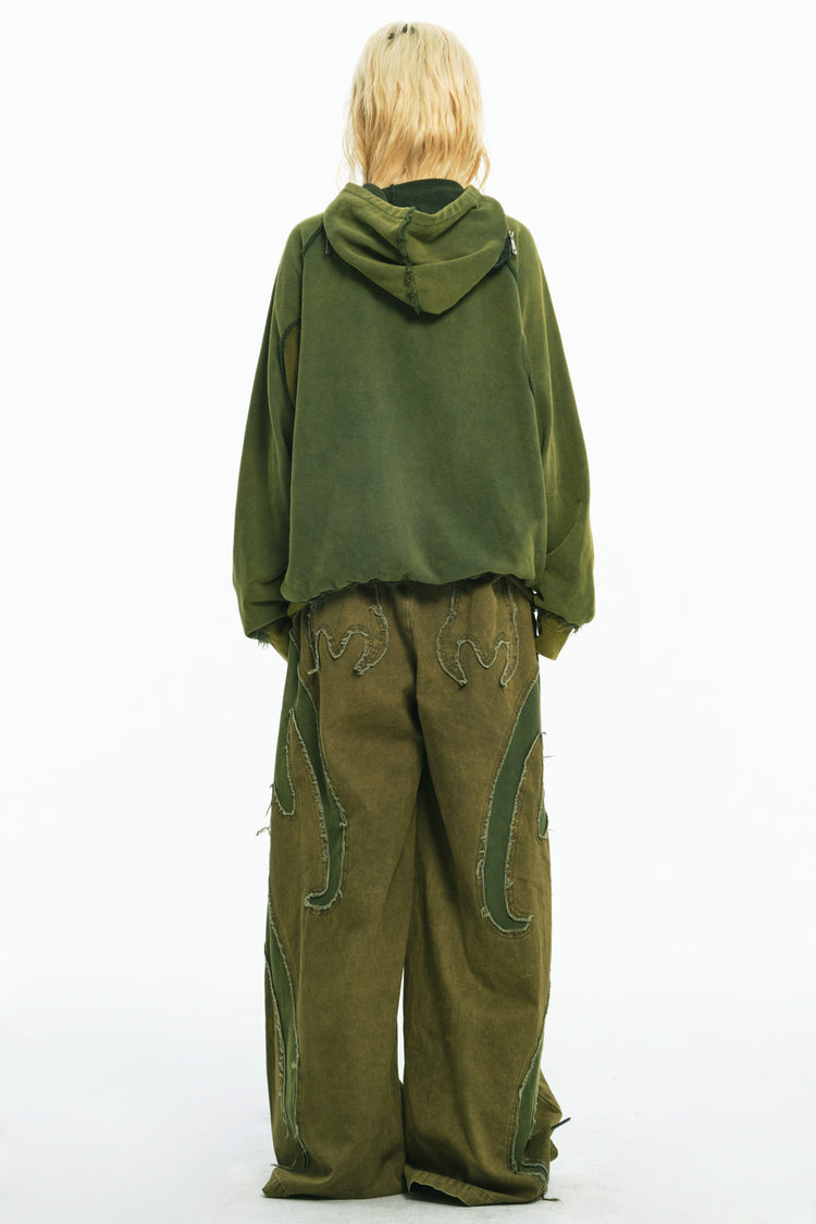EMBRYO GREEN GUARD distressed wide-leg pants — full-length modeled view