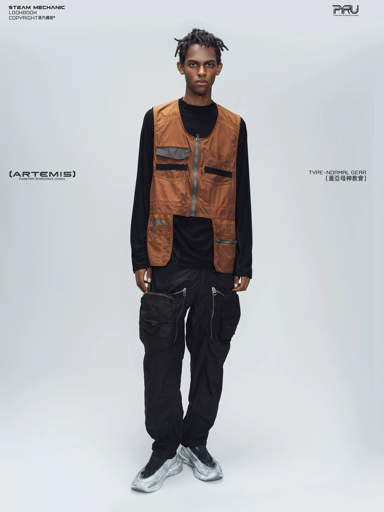 GAIA stone green curved-blade technical pants — material and silhouette detail