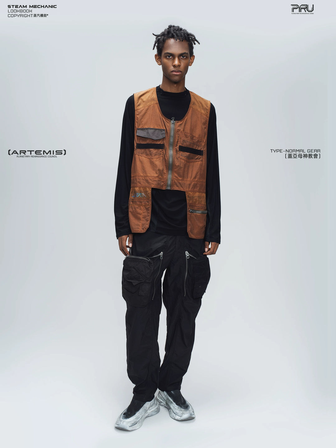 GAIA stone green curved-blade technical pants — material and silhouette detail