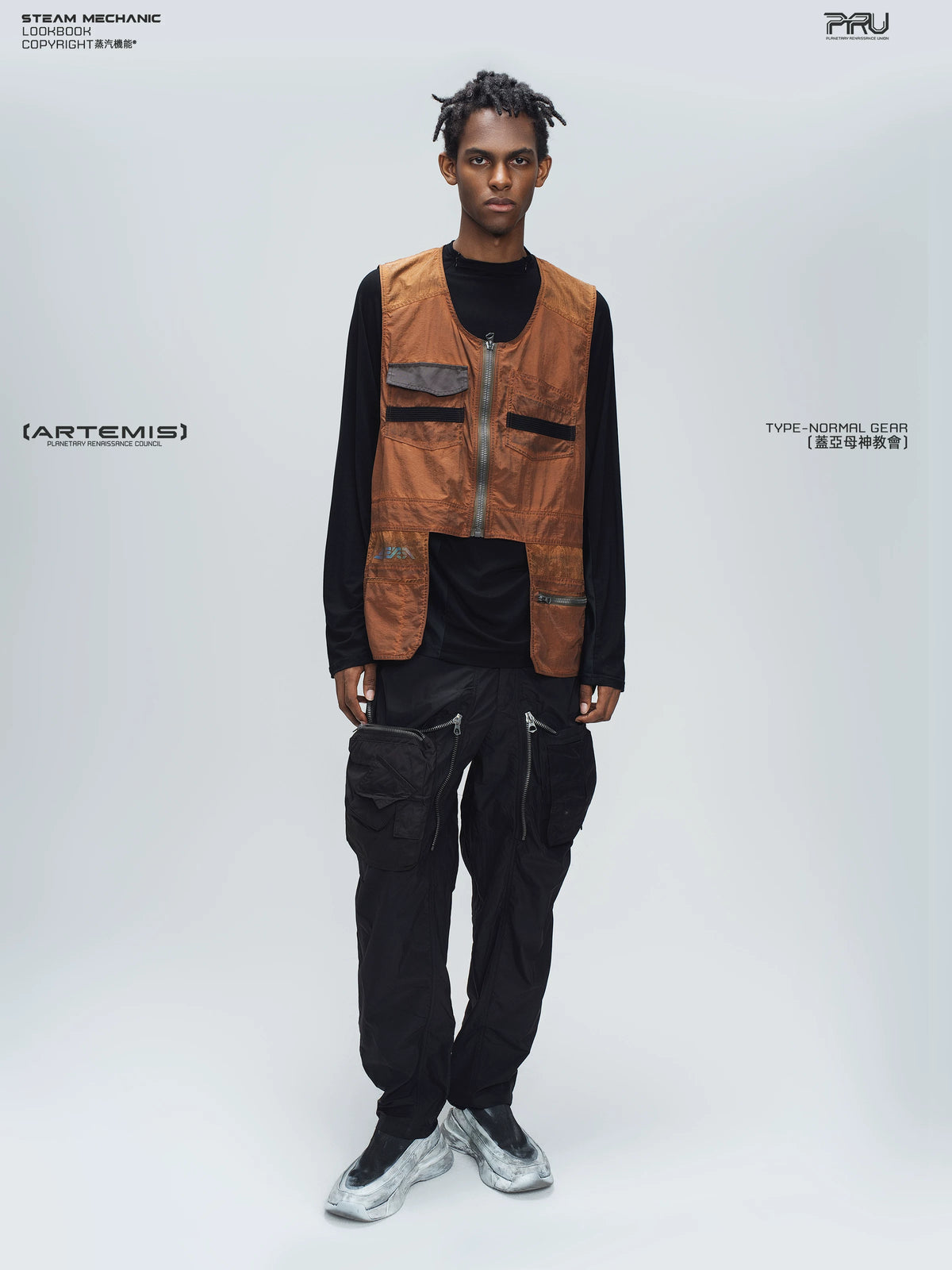 GAIA stone green curved-blade technical pants — material and silhouette detail