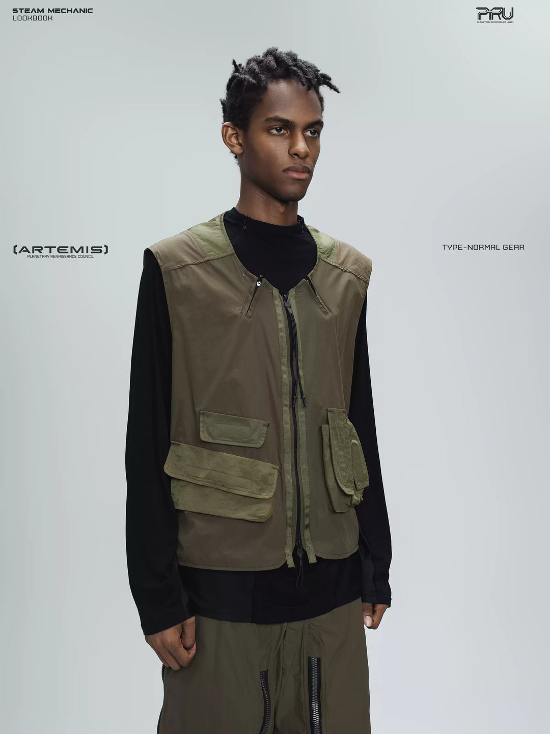 CLERIC utility nylon vest in vine gray green — three-quarter modeled view showing the split neckline and zip front