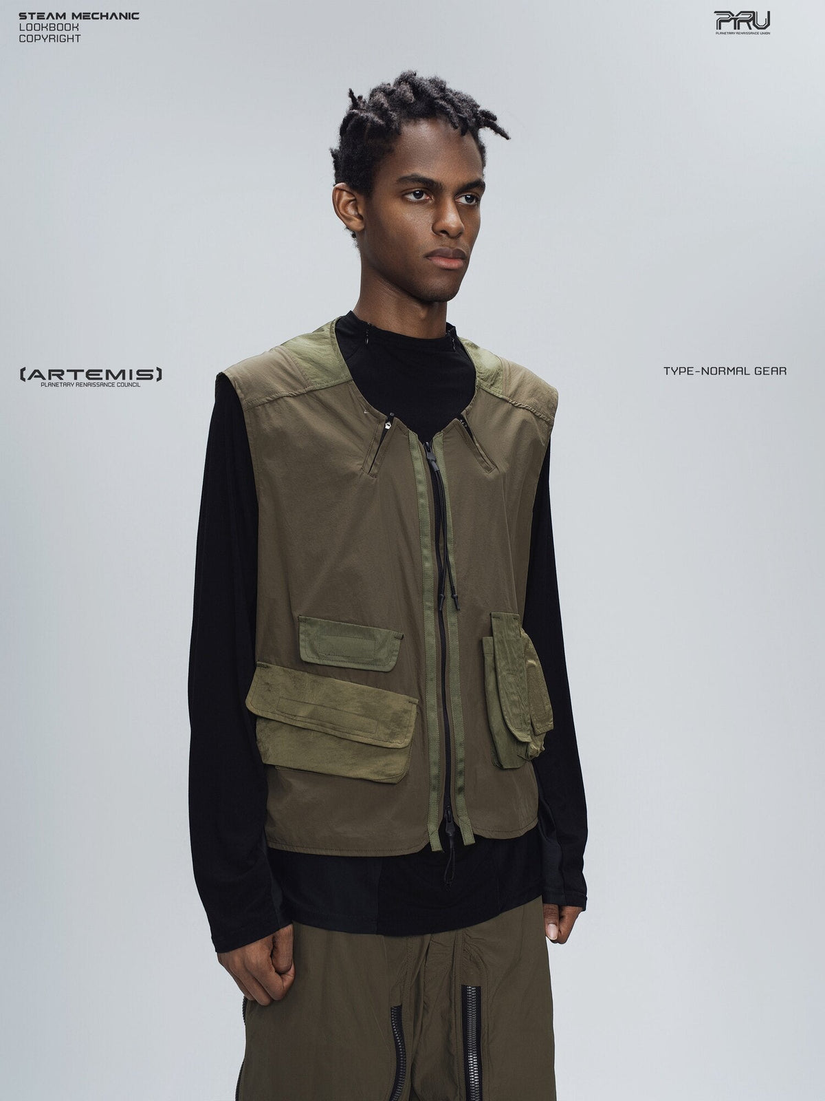 CLERIC utility nylon vest in vine gray green — three-quarter modeled view showing the split neckline and zip front