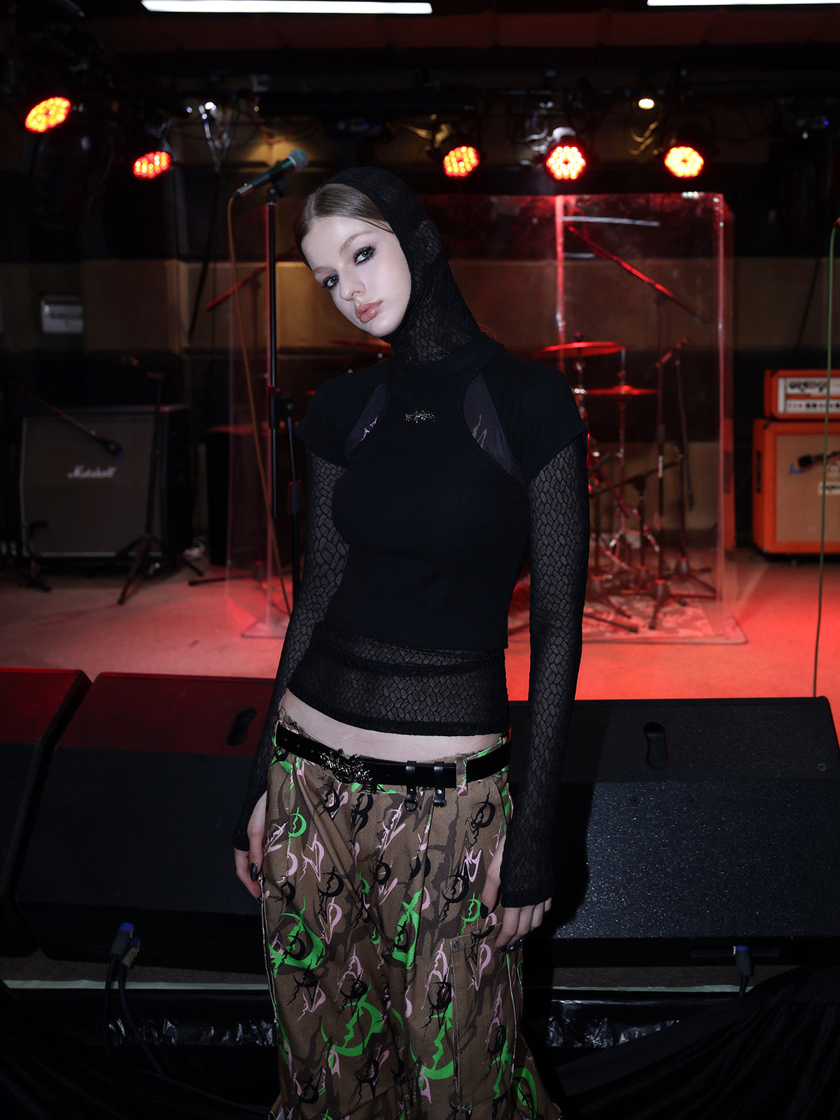 PINKSPINK ELECTRIC MOON sculpted camo cargo trousers in CAMOUFLAGE — close front showing waist and upper cargo pocket.