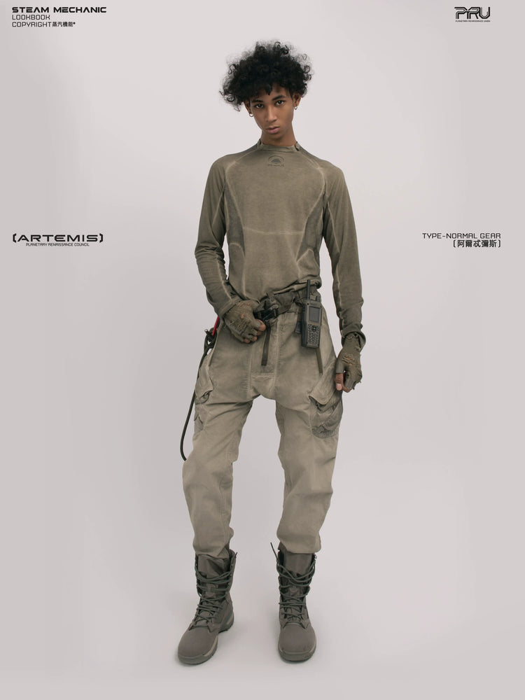 TWIN STAR lunar soil teal stretch riding base-layer top — side modeled view