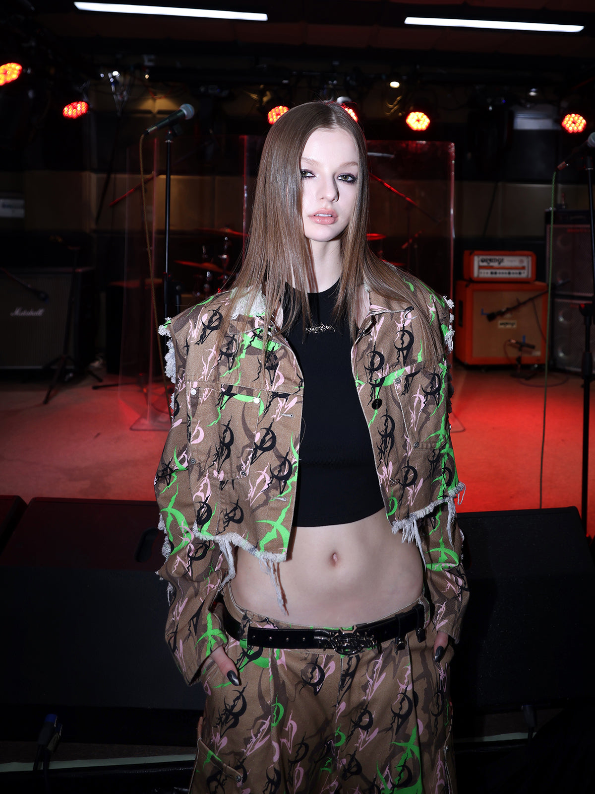PINKSPINK ELECTRIC MOON distressed camo cropped jacket in CAMOUFLAGE — close front view showing the chest pockets.