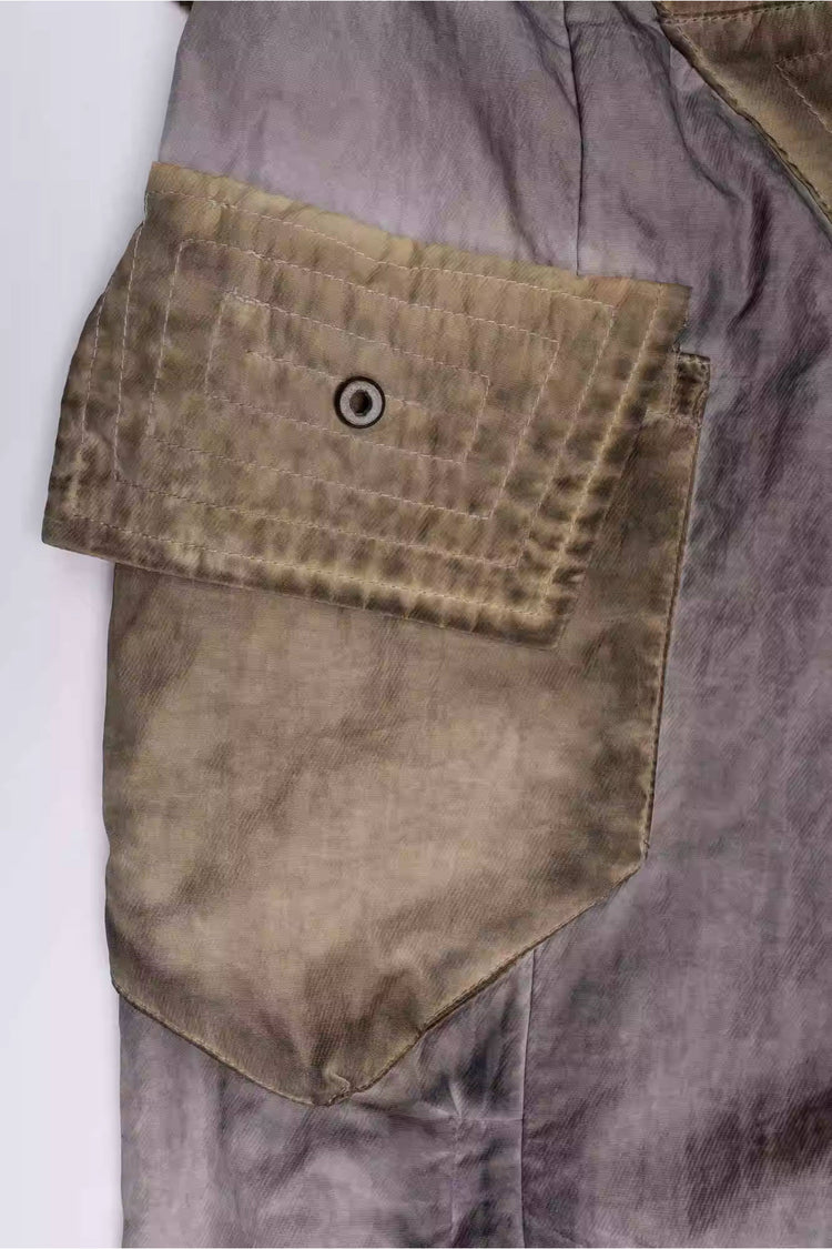 STARCORE mercury brown engineer utility pants — stitched rear flap pocket close-up
