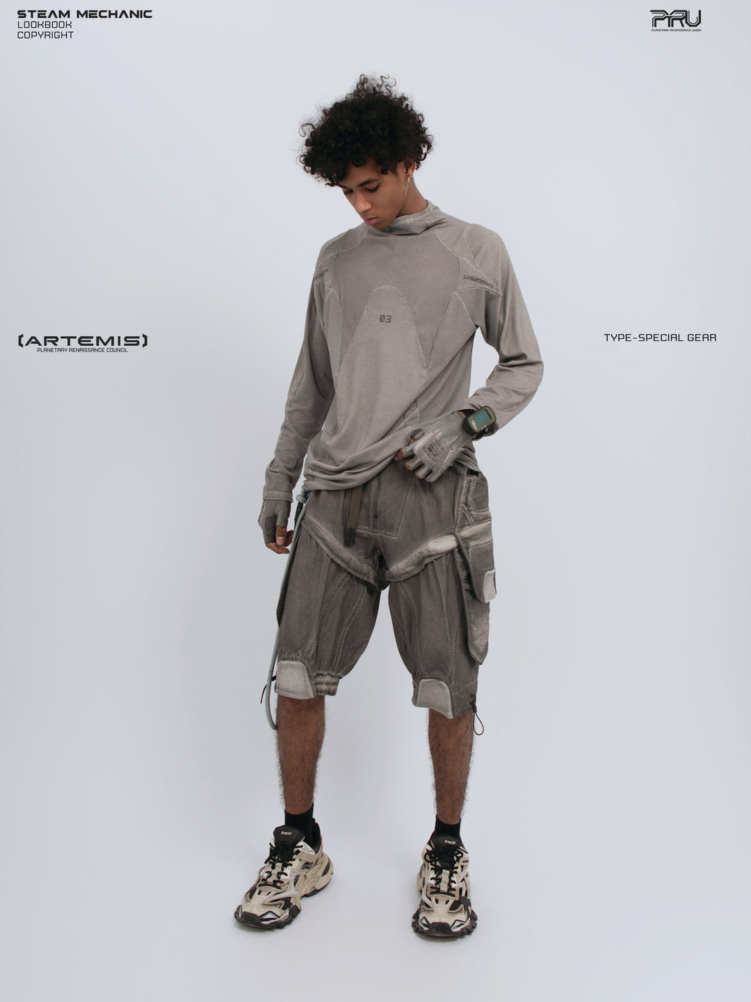 STARCORE mesh-panel long-sleeve top in dusk cloud gray — full-length modeled view looking down at the hem