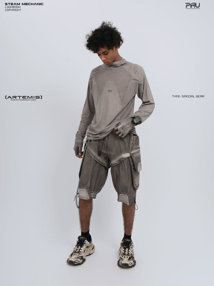 STARCORE mesh-panel long-sleeve top in dusk cloud gray — full-length modeled view looking down at the hem