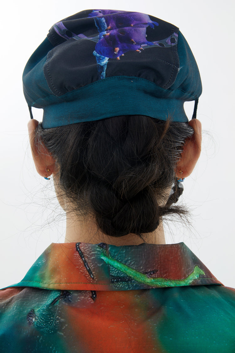 EMBRYO LARVA patchwork cycling cap — alternate modeled angle
