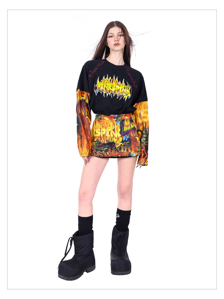 PINKSPINK FIRE CAT layered-sleeve graphic tee — modeled detail view of the garment construction