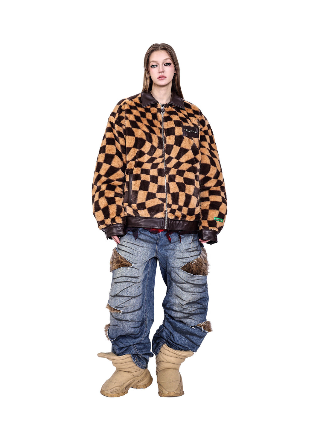 PINKSPINK WARPED checkerboard padded faux-fur jacket — caramel brown checkerboard jacket — full-length front view with jeans