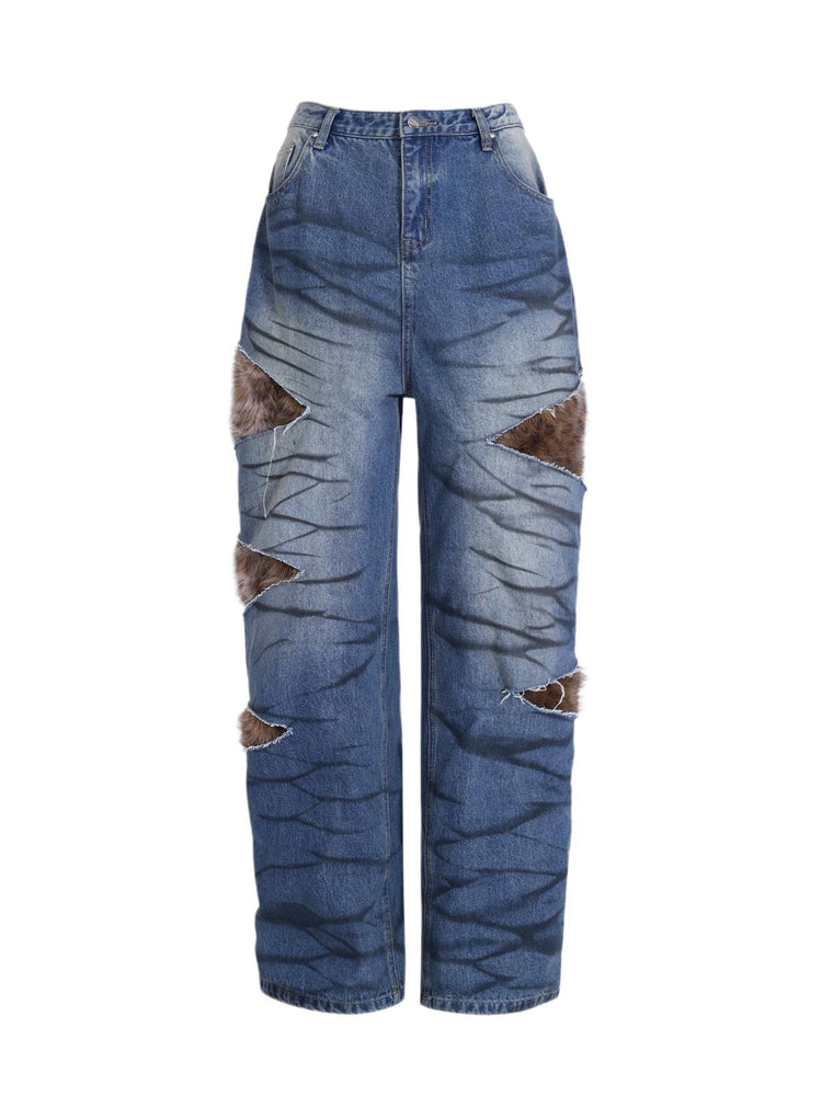 PINKSPINK SCRATCH leopard-panel layered jeans — isolated front view showing washed blue denim, low waist and faux-fur cutout panels