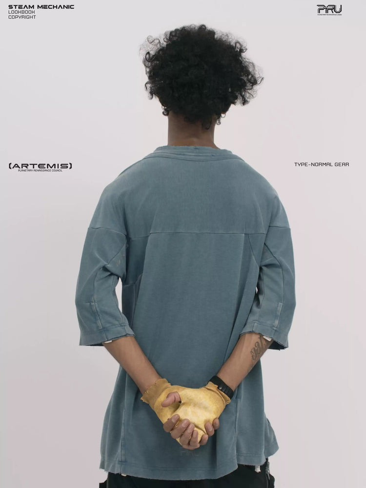 LIGHTSHADOW mycelium blue deconstructed technical tee — back three-quarter view with hands clasped behind
