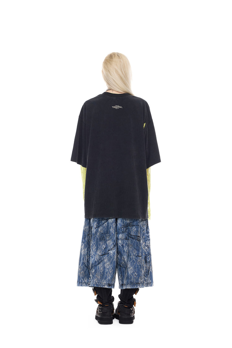 PINKSPINK ELECTRIC MOON lace-coated wide-leg denim shorts in blue — full-length back modeled view with a washed black tee and yellow lace sleeves