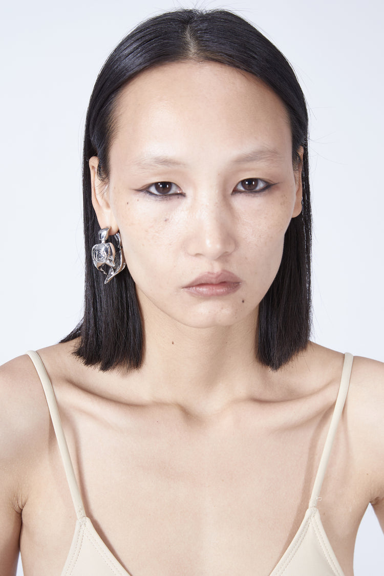 EMBRYO VENOM CLAW sculptural earrings — full-length modeled view