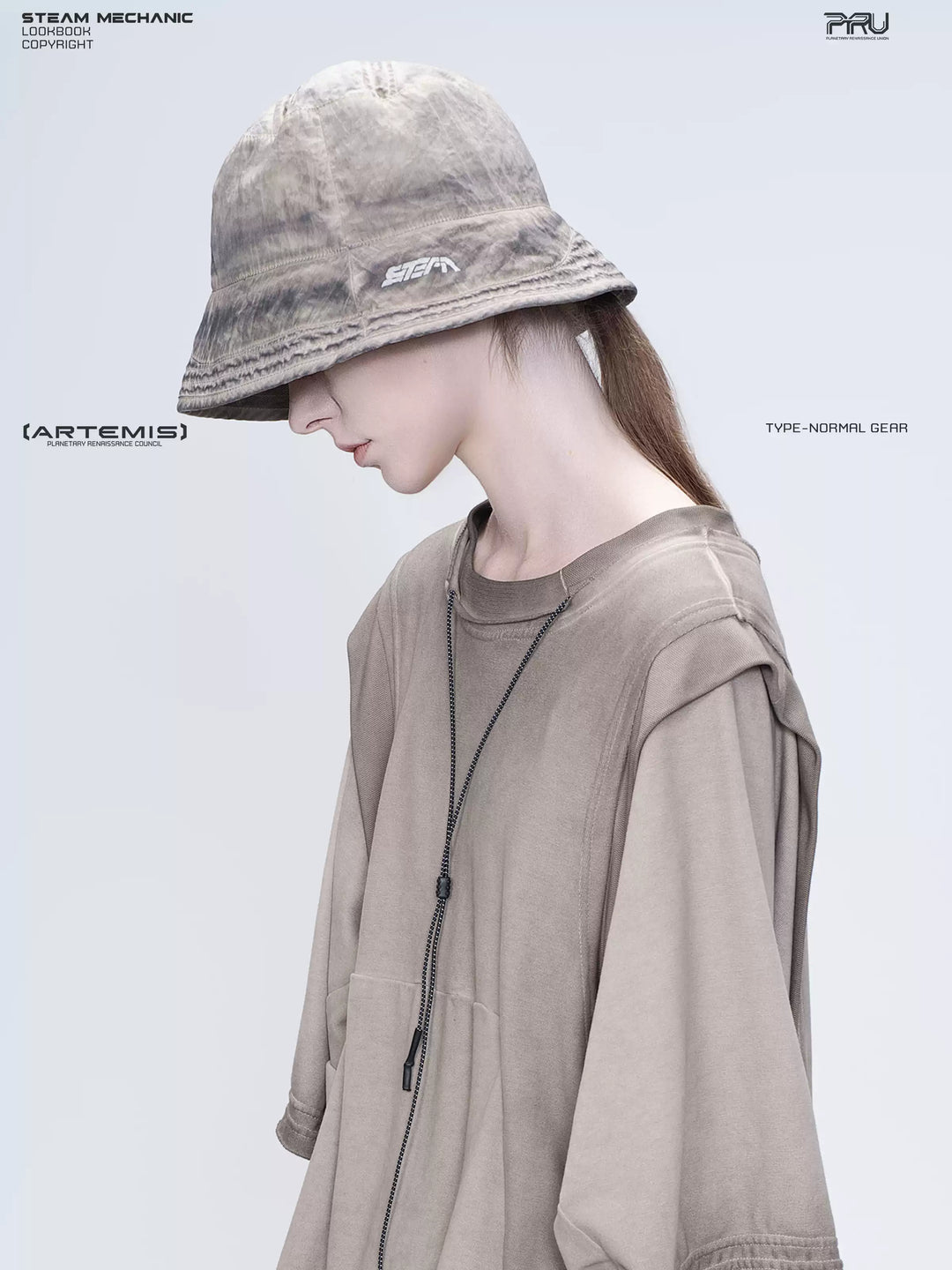 PIONEER mercury brown distressed nylon bucket hat — left-facing profile showing the brim logo