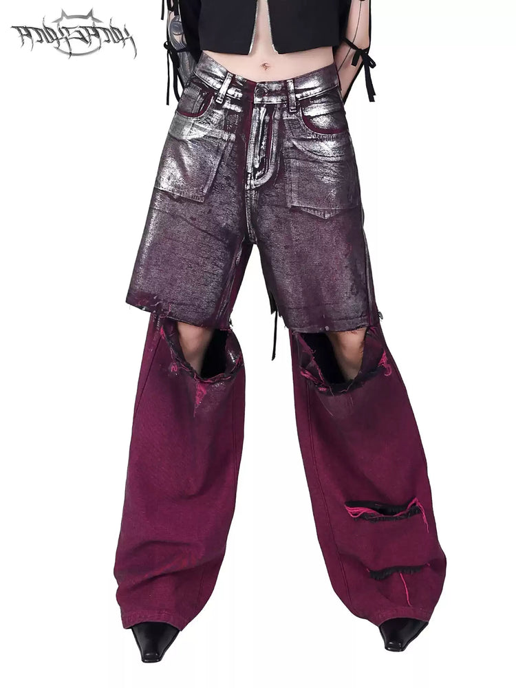 PINKSPINK ELECTRIC MOON silver-coated convertible jeans in burgundy silver — front modeled close-up showing the silver coating and detached-knee construction