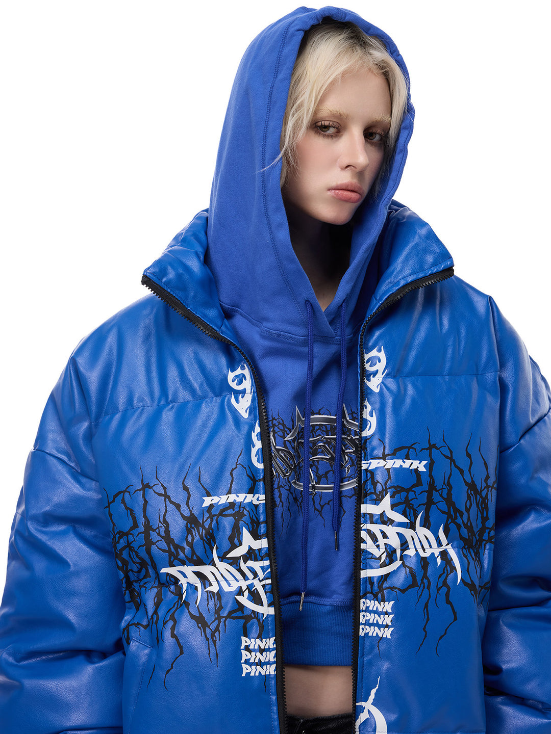PINKSPINK MOTORBLOC padded faux-leather jacket — Klein blue close-up of high collar and graphic