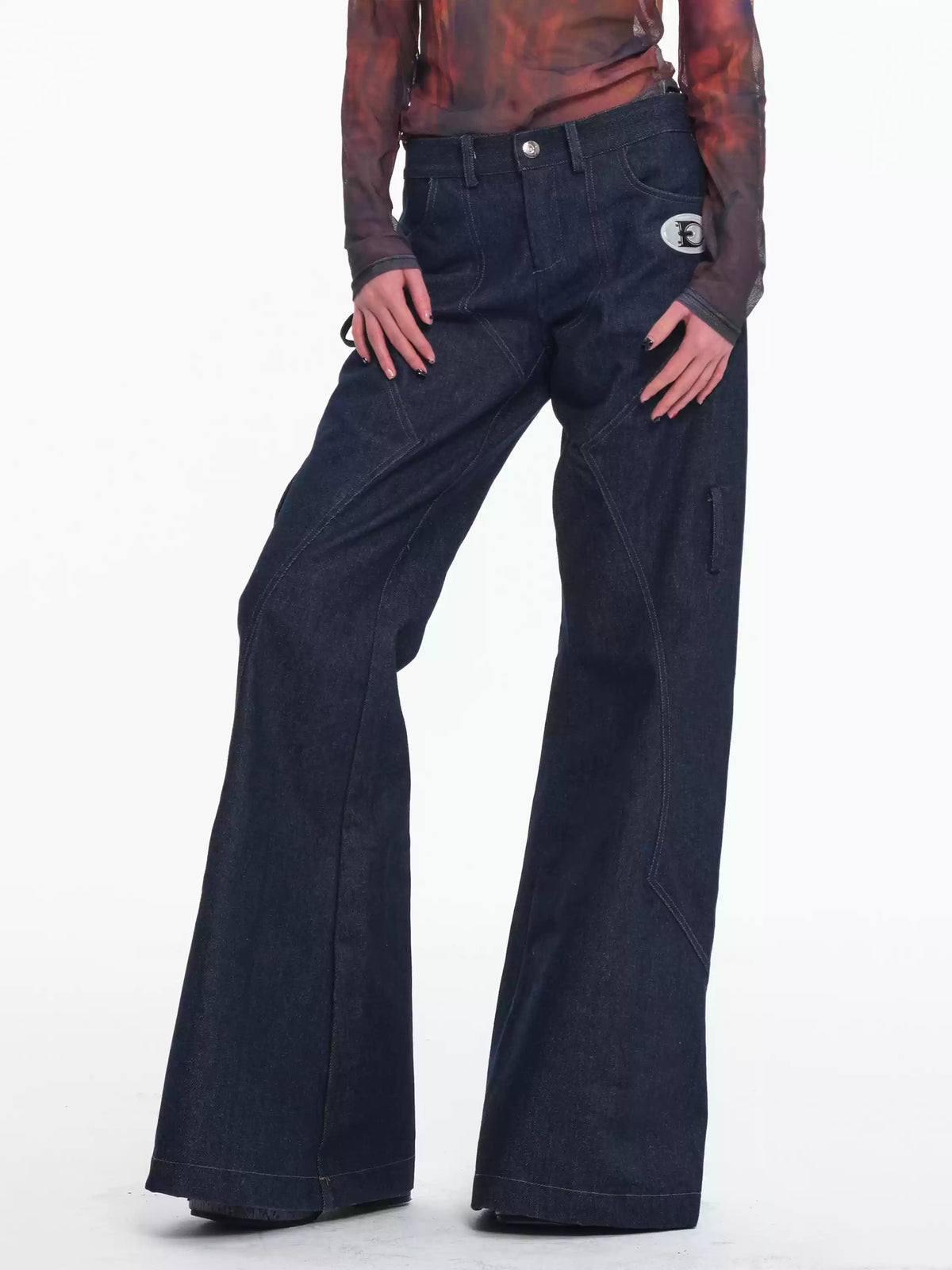 EMBRYO BONE FRAME low-rise flare pants & waist panel — rear or construction presentation