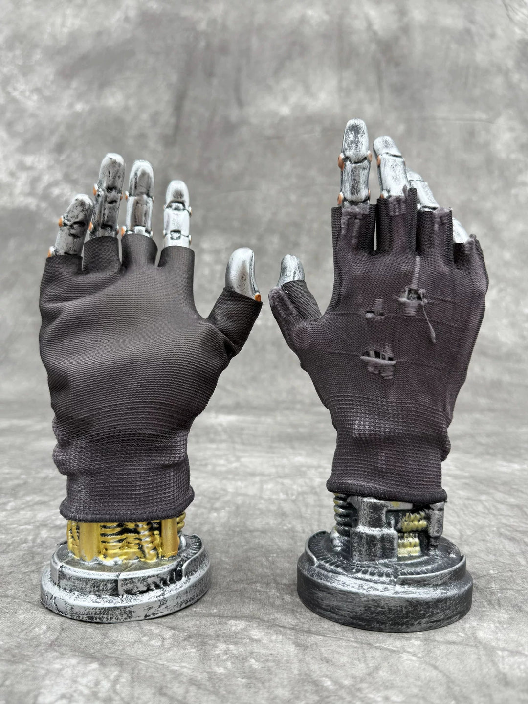 PRECISION CASTING distressed fingerless gloves in dust purple — distressed fingerless gloves on upright metal display hands