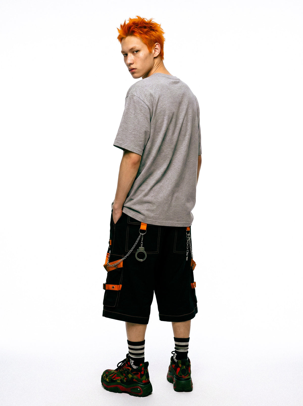 DEADENDKIDS NUMB HEART oversized graphic tee — rear modeled view