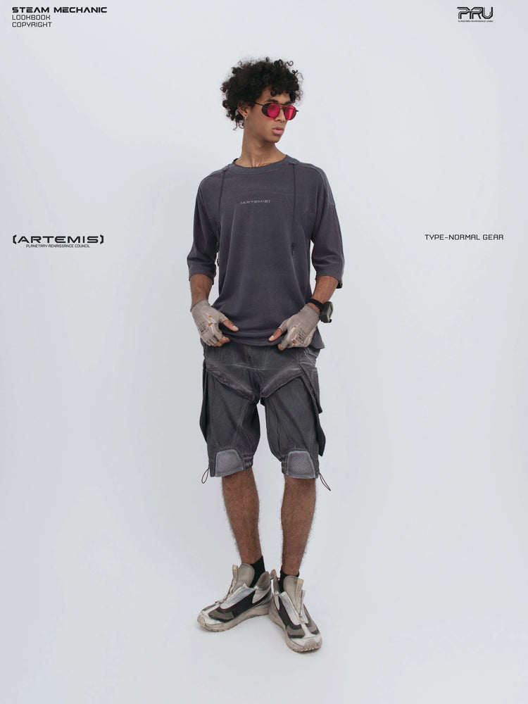 LIGHTSHADOW spirit deconstructed technical tee — full-length front view holding both sides of the hem