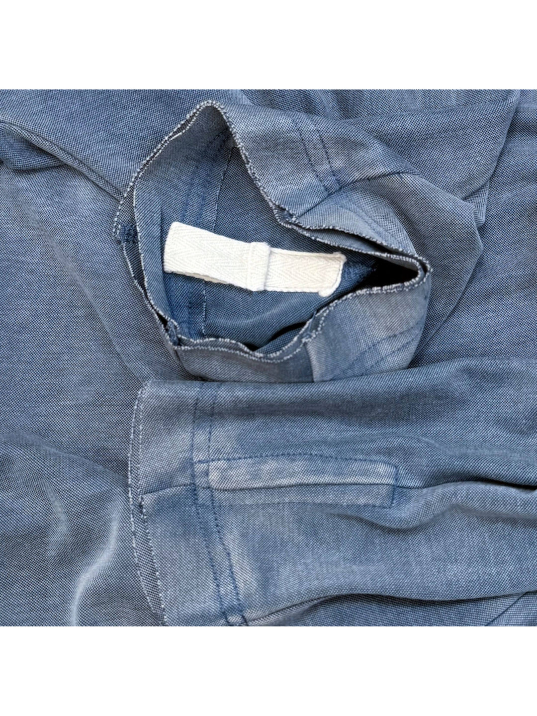 LIGHTSHADOW mycelium blue deconstructed technical tee — blue neckline and interior tape close-up