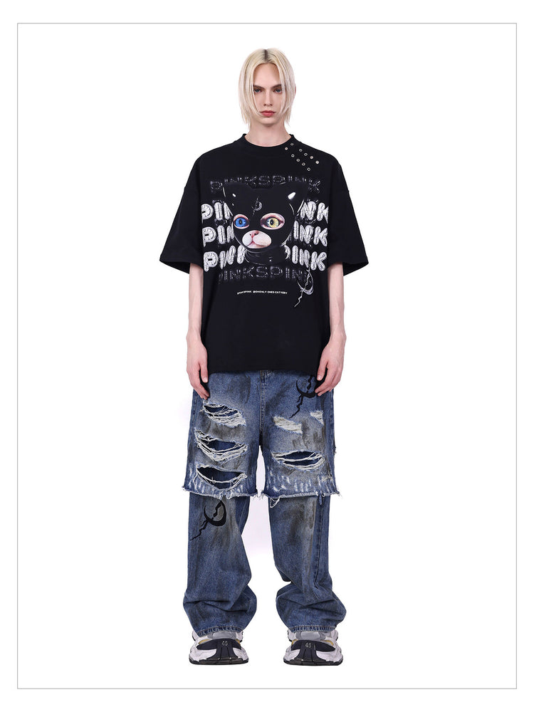 PINKSPINK GERMAN CAT oversized graphic tee — product detail view showing texture and hardware