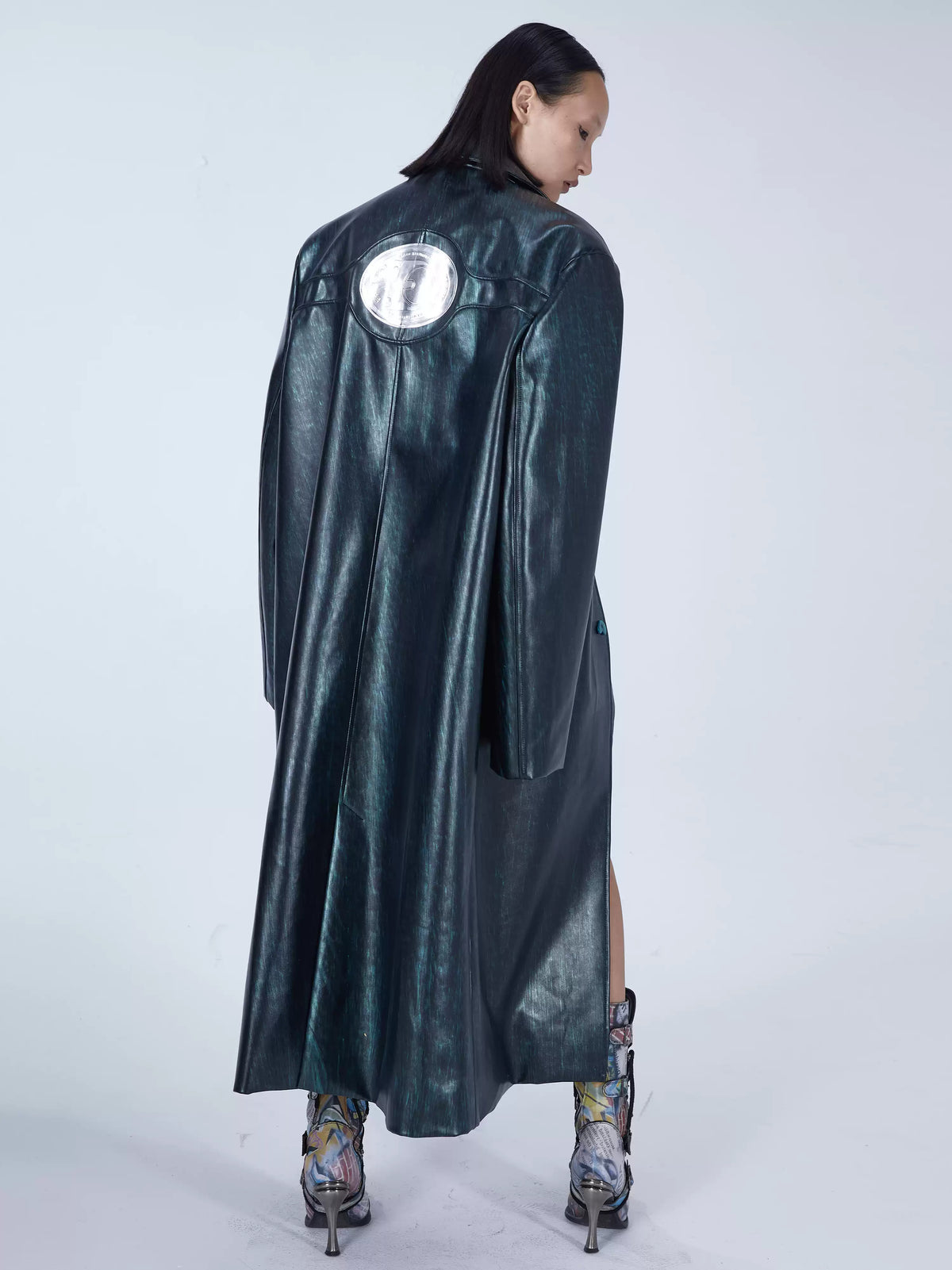EMBRYO MATRIX buckle PU leather trench coat — full-length back modeled view