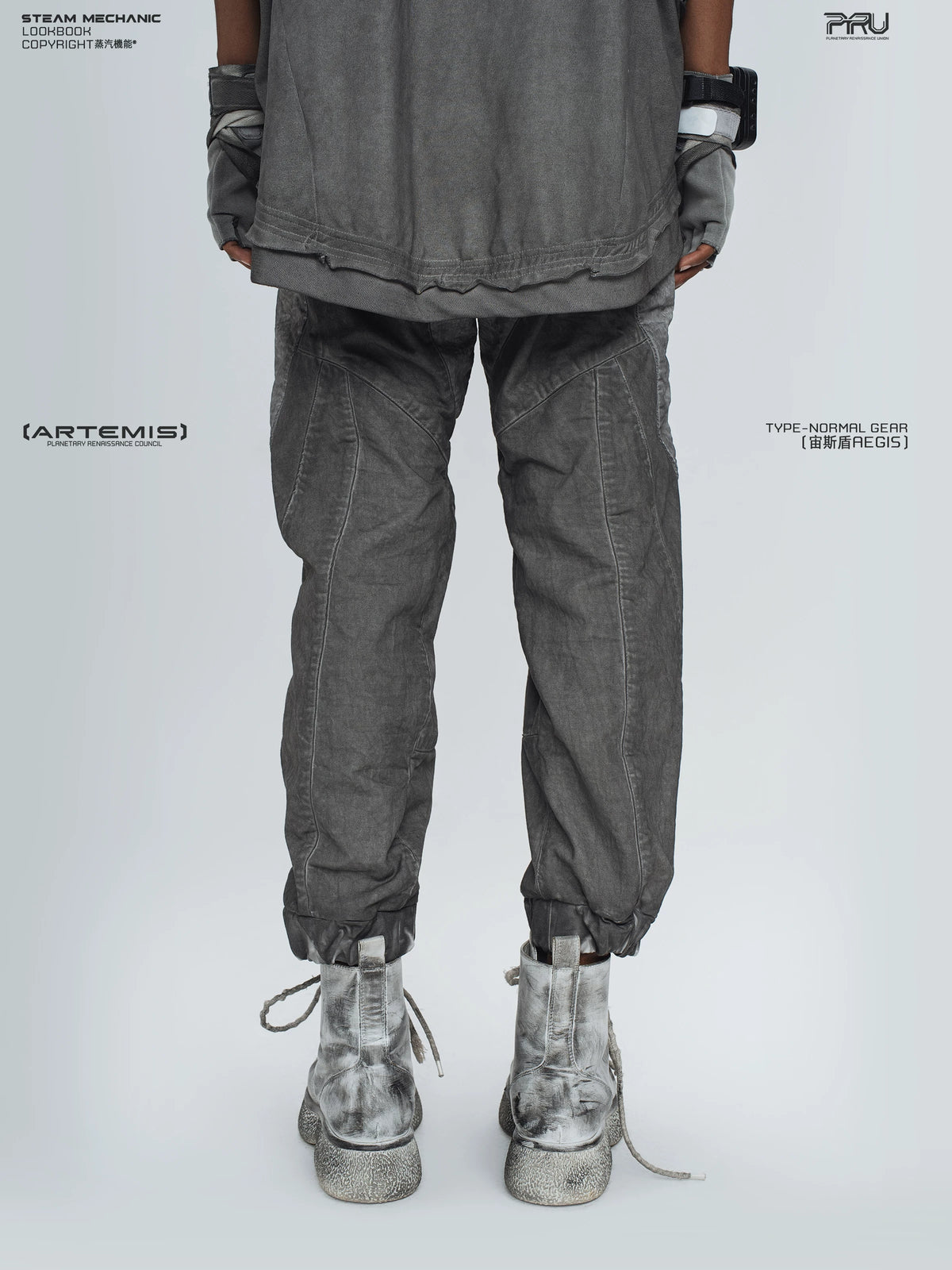AEGIS moon dust gray cropped moto riding pants — rear modeled view