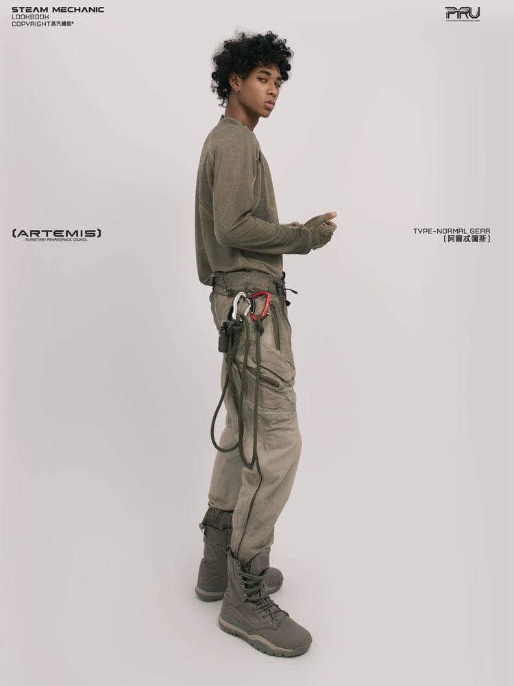 TWIN STAR lunar soil teal stretch riding base-layer top — full-length styled view