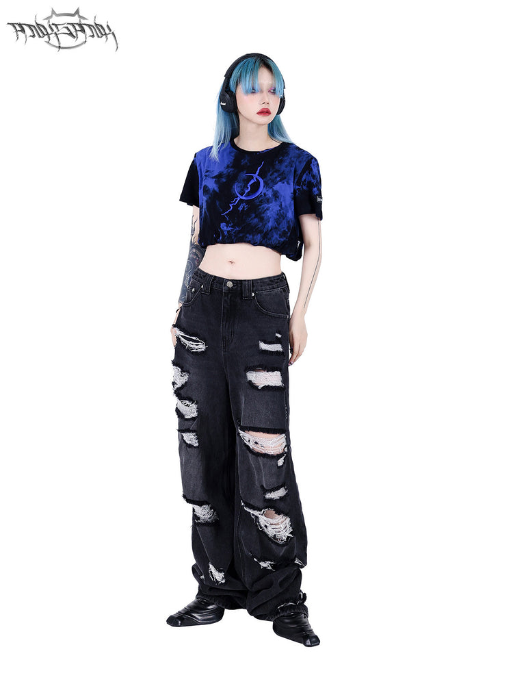 PINKSPINK ELECTRIC MOON double-layer tie-dye crop tee — blue-black front modeled view with head tilted