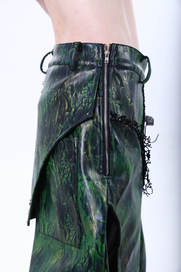 EMBRYO TRIANGLE ARMOR lace-inset leather pants in green — side waist detail showing belt loops and metal ring