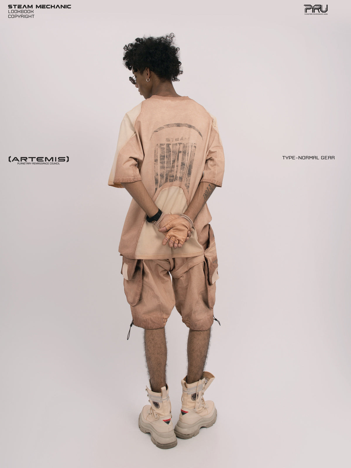 VOID soft dawn orange breathable technical tee — full-length rear modeled view with hands clasped