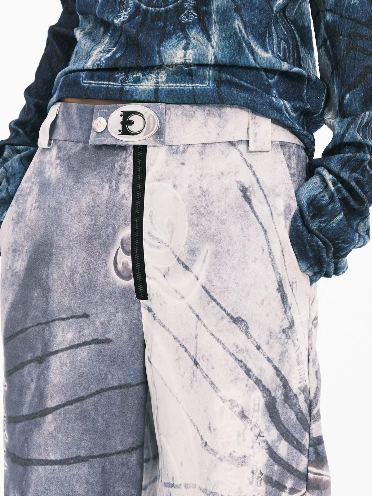 EMBRYO ANCIENT CODE coated wide-leg pants — side profile