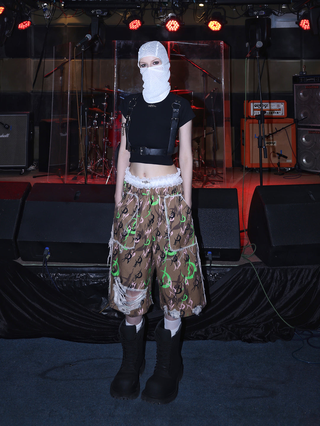 PINKSPINK ELECTRIC MOON distressed camo cropped trousers in CAMOUFLAGE — full front with white mesh hood.