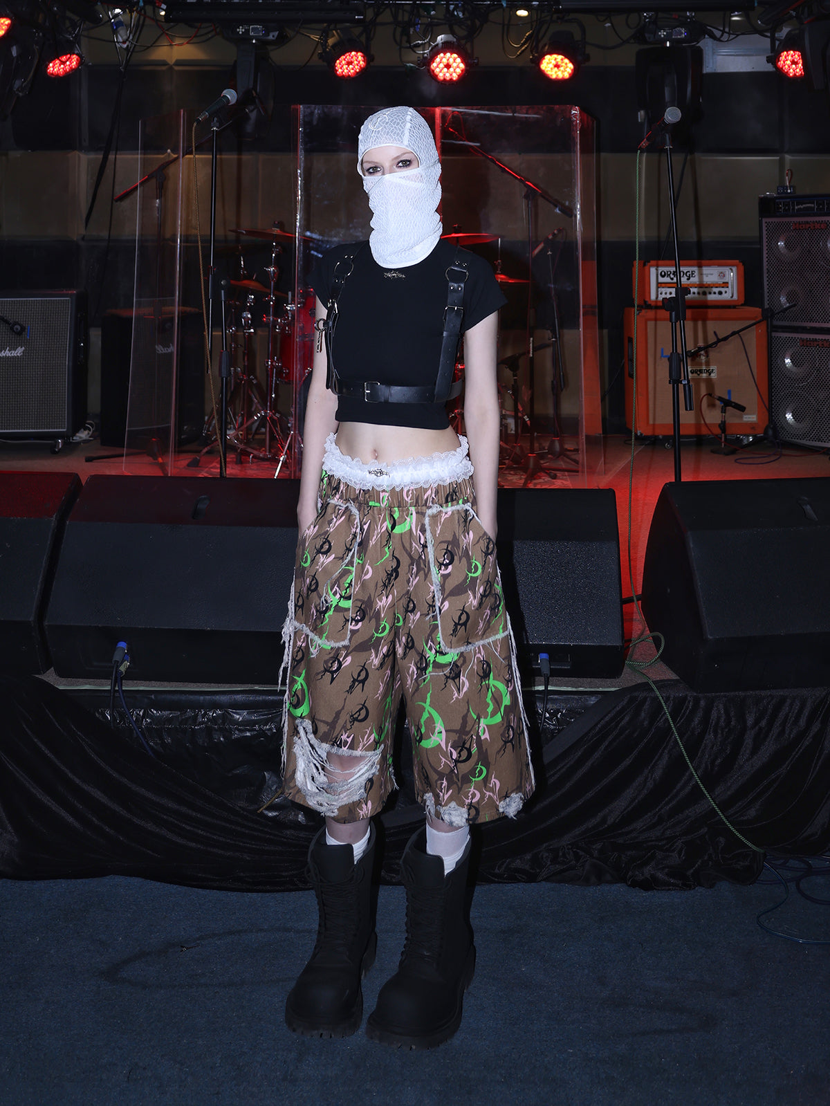 PINKSPINK ELECTRIC MOON distressed camo cropped trousers in CAMOUFLAGE — full front with white mesh hood.