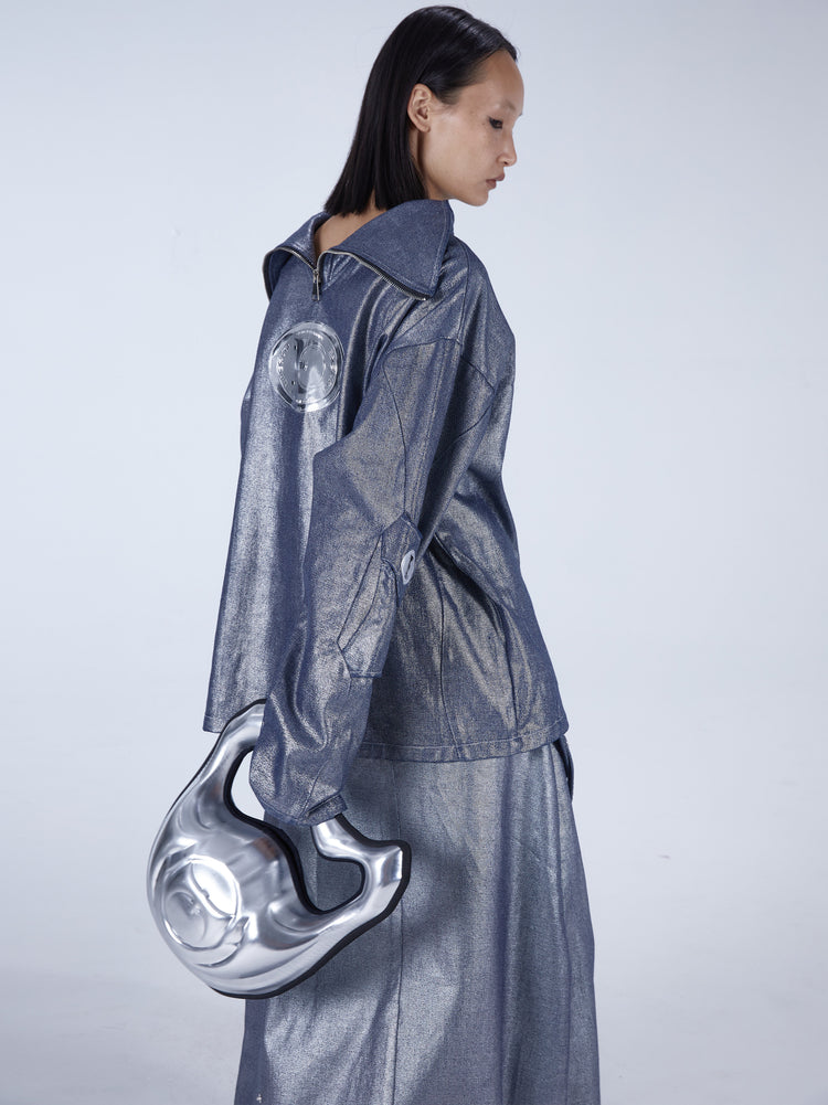 EMBRYO GRAVITY sculptural 3D handbag — alternate modeled angle