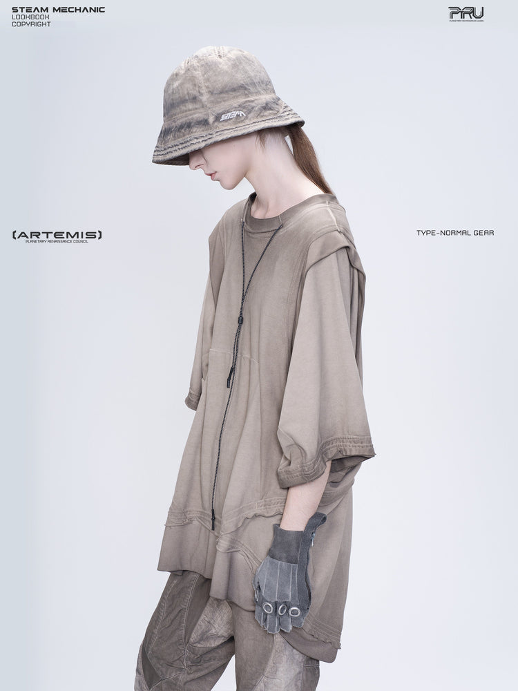 PIONEER mercury brown distressed nylon bucket hat — left-facing modeled view showing the brim logo