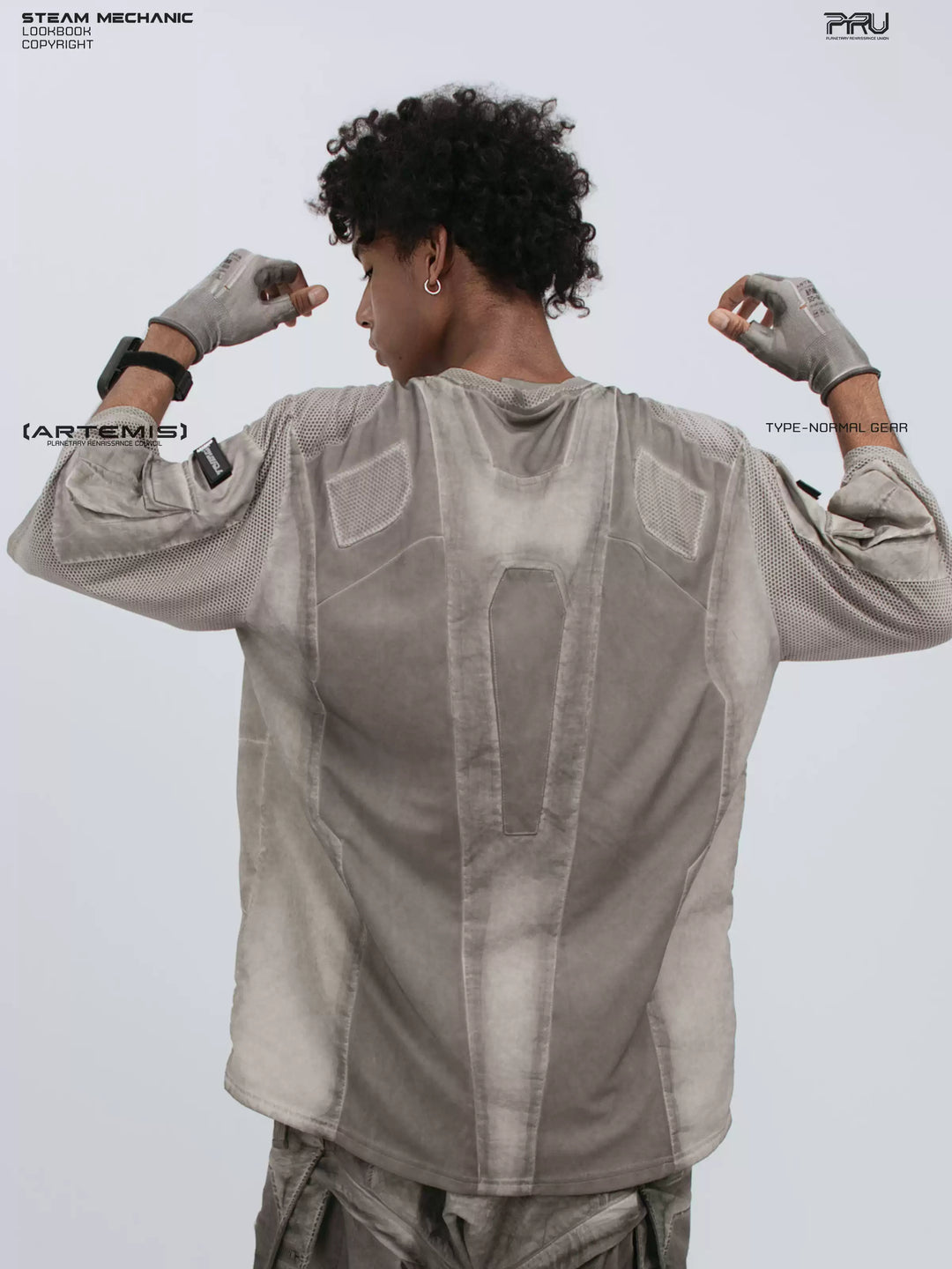 STARCORE xirang brown velcro mesh tee — back three-quarter modeled view with arms raised, showing mesh panels