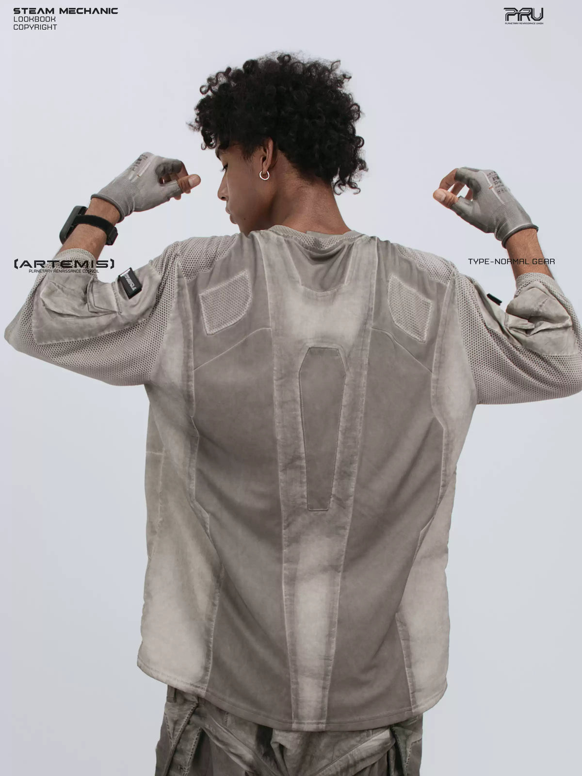 STARCORE xirang brown velcro mesh tee — back three-quarter modeled view with arms raised, showing mesh panels