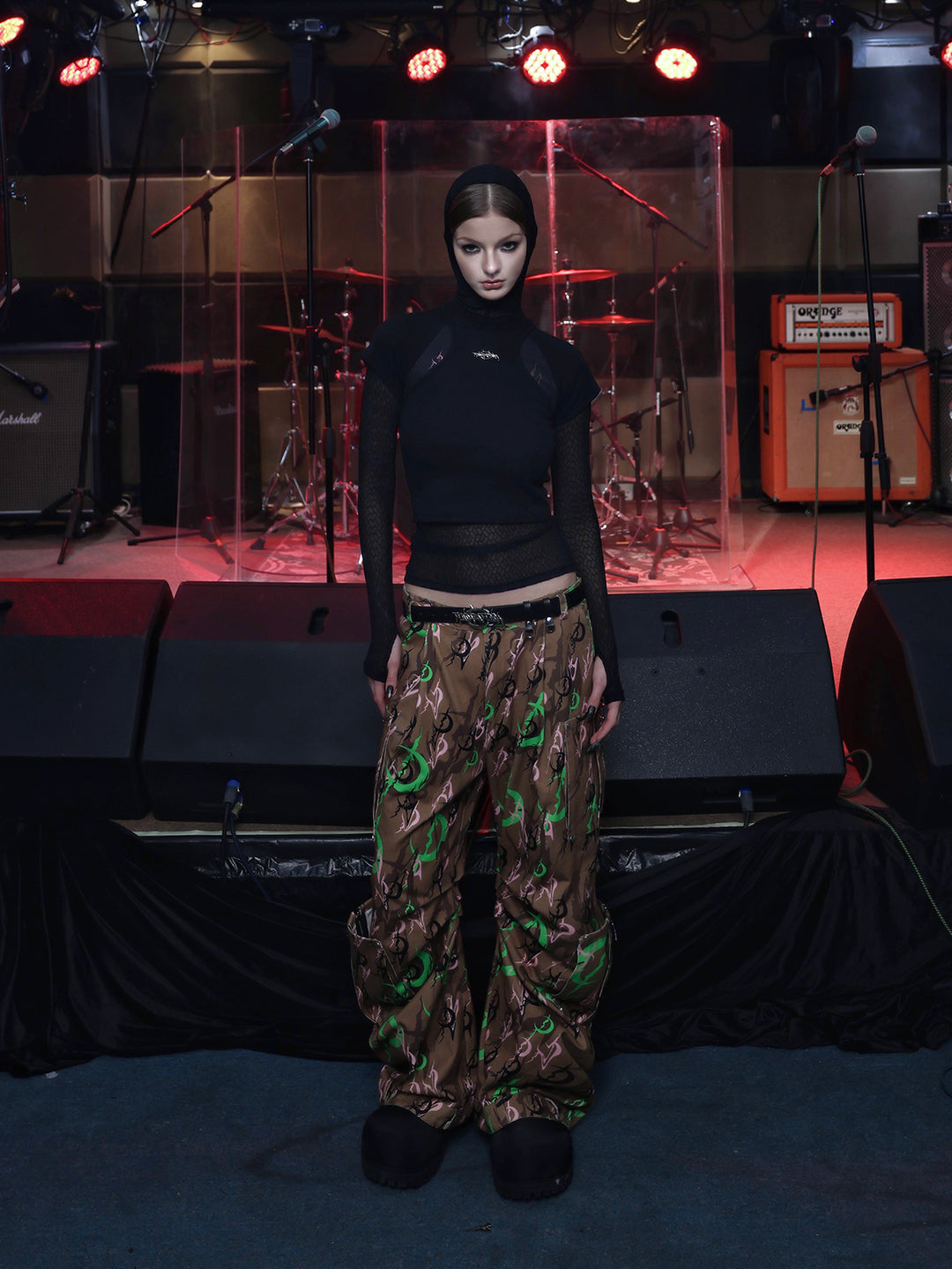 PINKSPINK ELECTRIC MOON sculpted camo cargo trousers in CAMOUFLAGE — full front with black layered top.