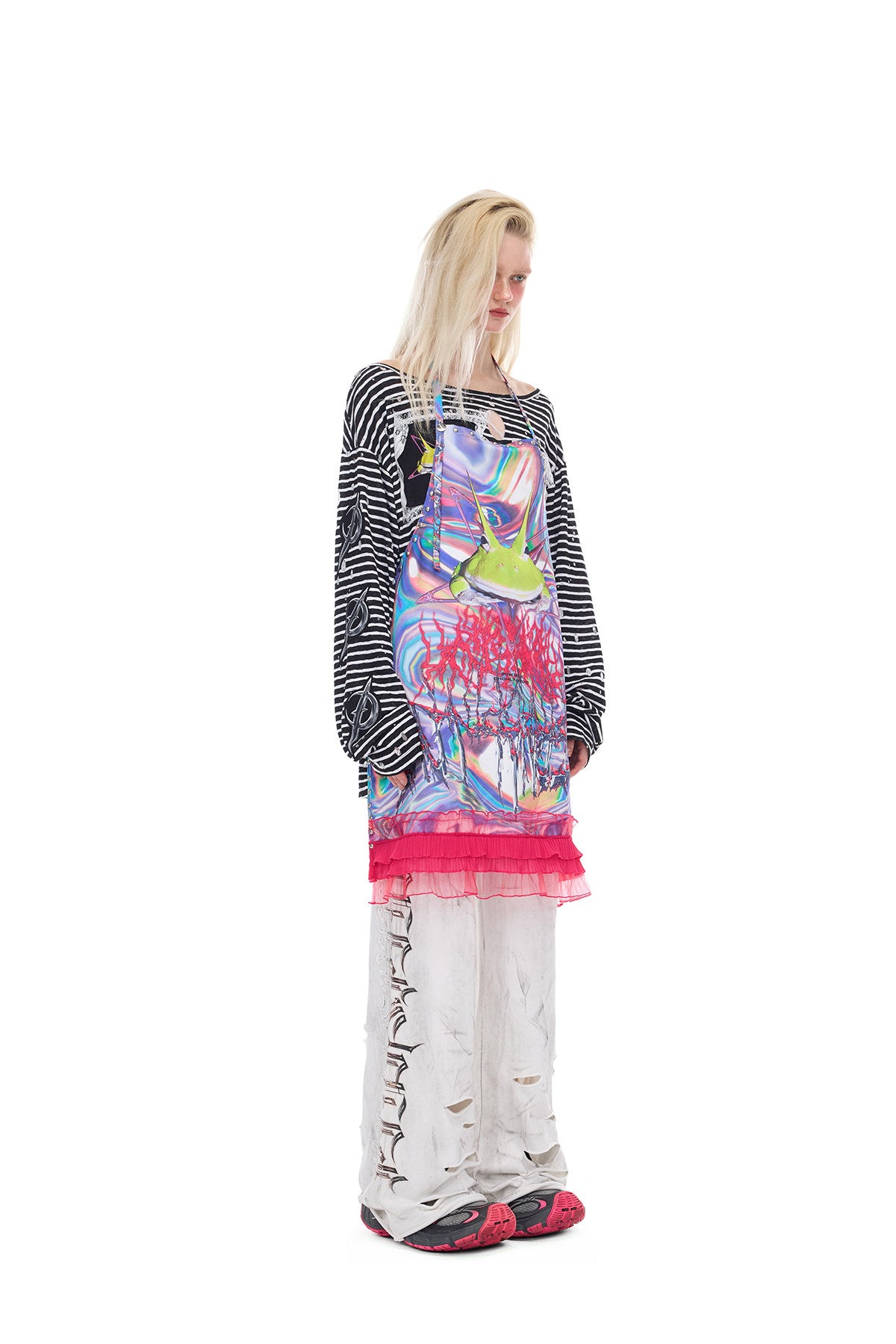 PINKSPINK ELECTRIC MOON coated distressed flare sweatpants — close modeled view highlighting the construction