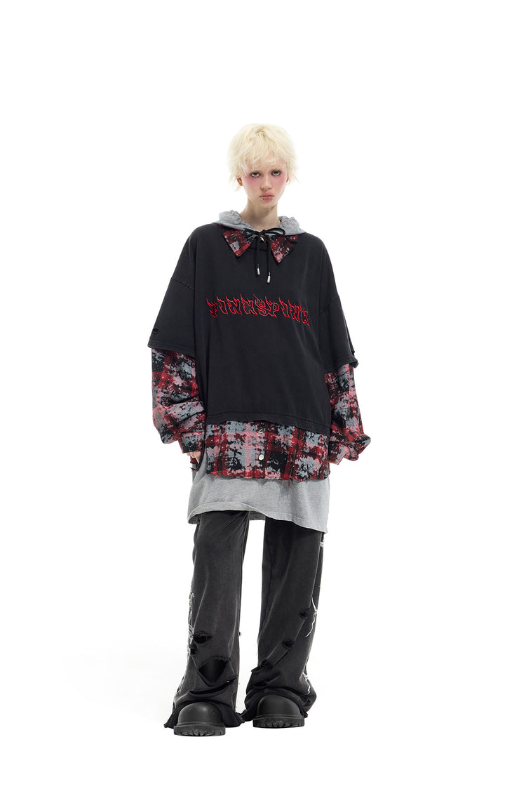 PINKSPINK REMAKE triple-layer plaid hoodie — black and red plaid hoodie — angled front view with trousers