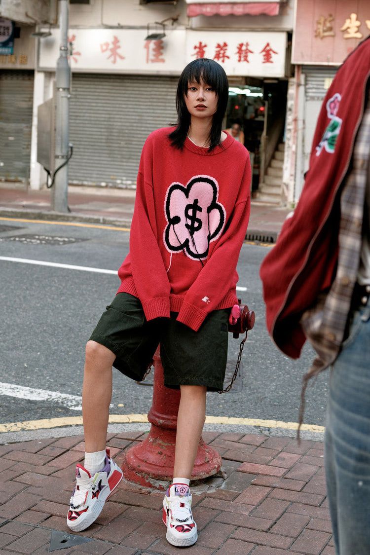 STARTER RICHFLOWER Fortune Red sneakers styled with a red graphic sweater and dark shorts on a street, full-body view