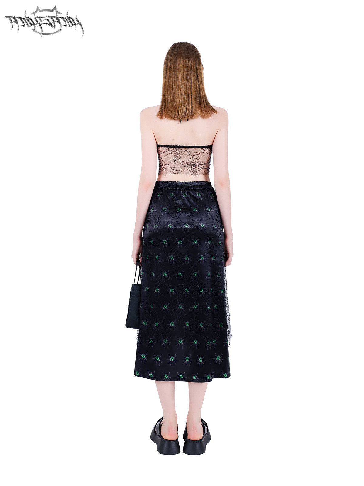 PINKSPINK SPIDER web-mesh halter crop top — back modeled view showing the web-mesh panel and neck ties