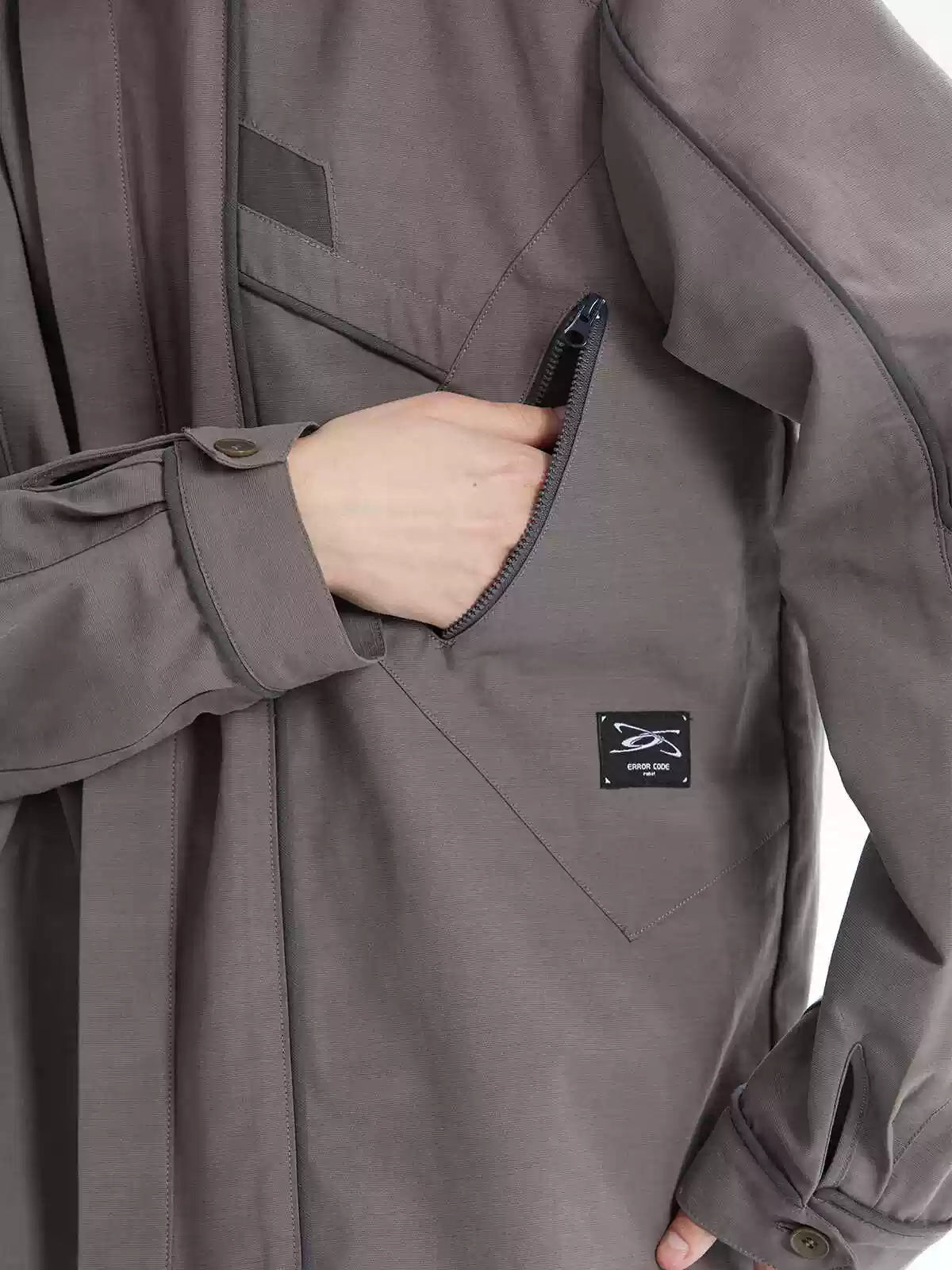 ERRORCODE ROBOT taupe tech work shirt — zip utility-pocket close-up; source gallery image 5